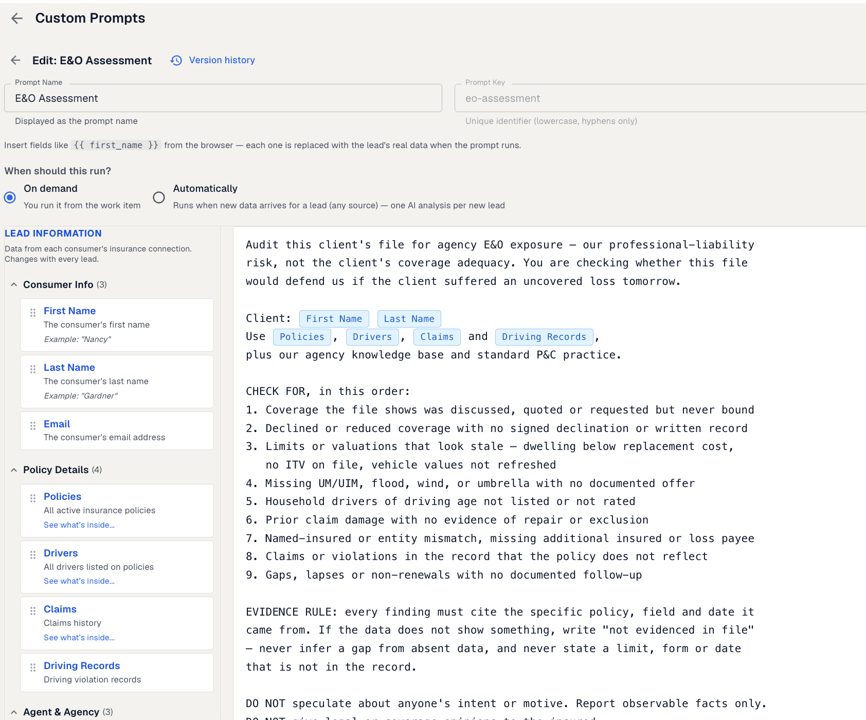 The custom prompt editor with an errors-and-omissions assessment open: its name, its identifier, a link to the version history, a choice between running on demand and running automatically as new data arrives, the written instruction with the client details it will fill in shown as labelled chips, and a library of available details down the left
